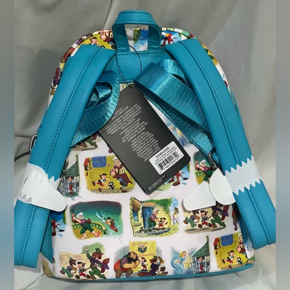 NWT-Loungefly/Disney’s Pinocchio painting AOP mini backpack - Picture 9 of 11